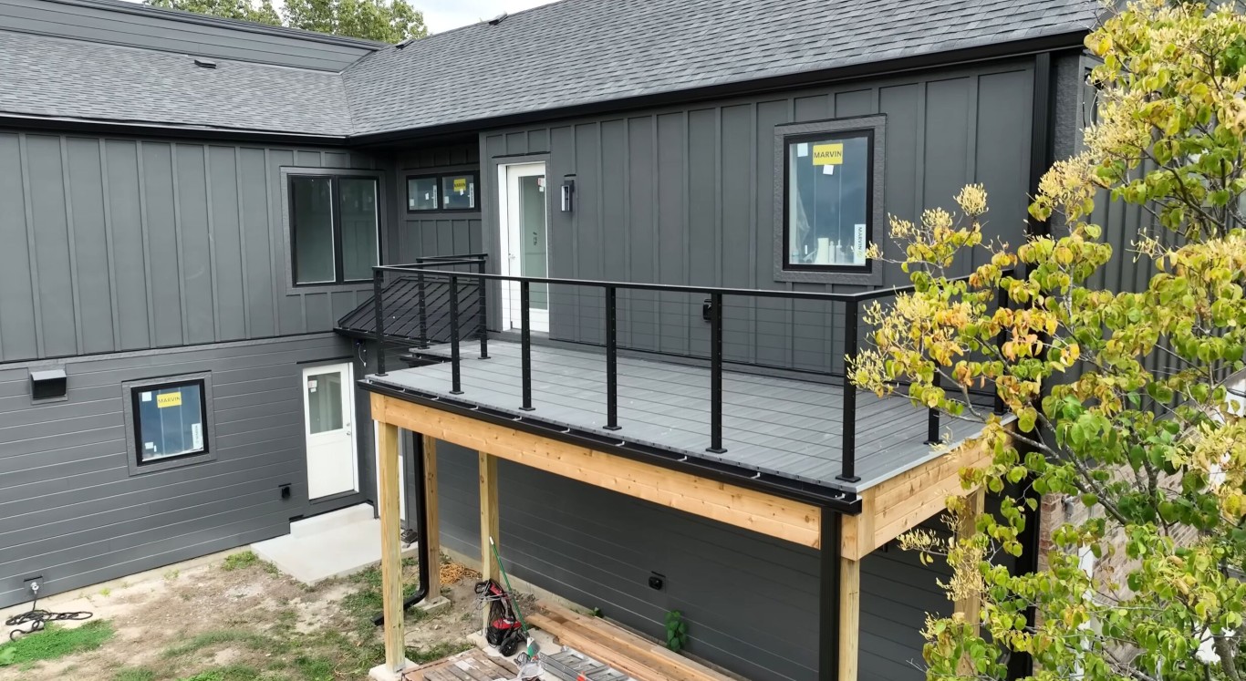 Modern elevated composite deck with metal railings in Ontario, CA